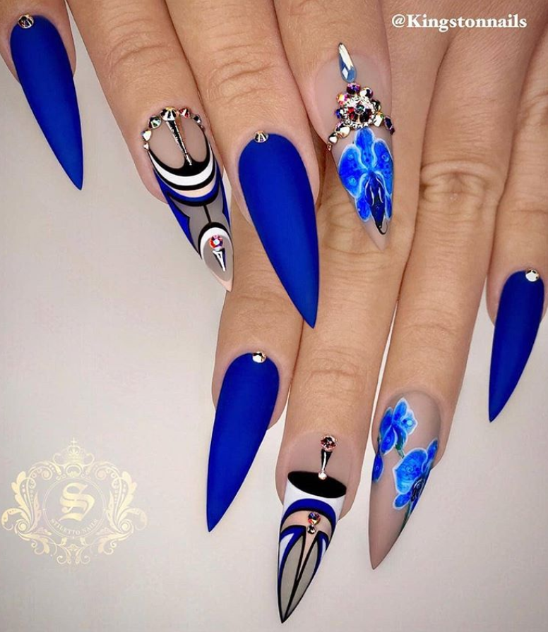 Blue nails with design,  Light blue nails,   Navy blue nails,  Royal blue nails,  Acrylic blue nails,  blue nails designs,  sparkly blue nails,  glitter blue nails,  pastel blue nails,  blue stiletto nails,  blue stilleto nails,  blue sparkly nails