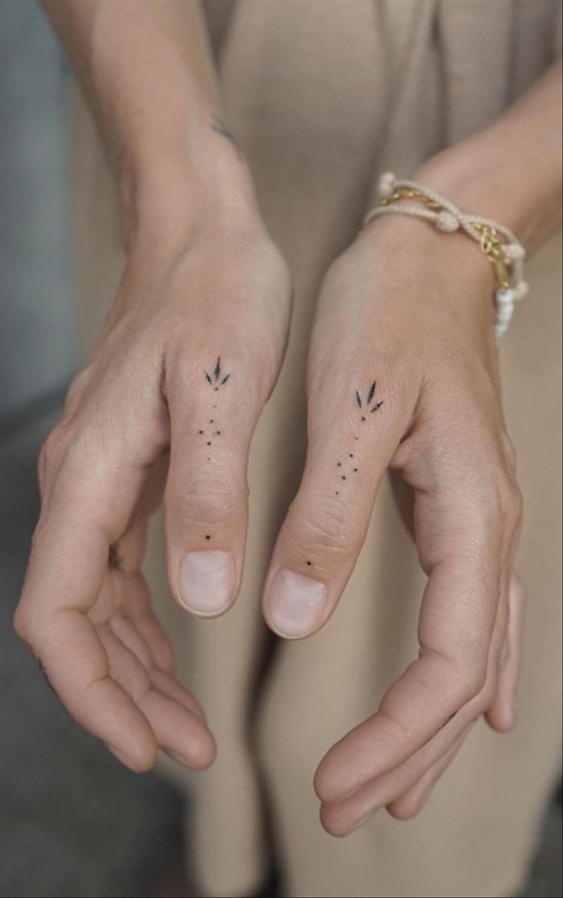 Pretty finger tattoos for girls with meaning