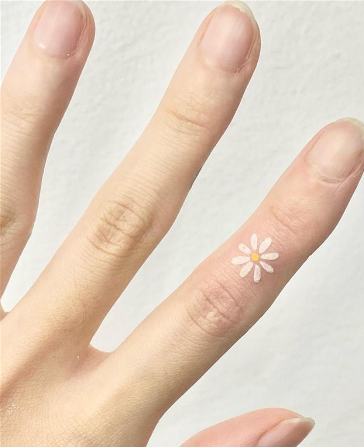 Pretty finger tattoos for girls with meaning