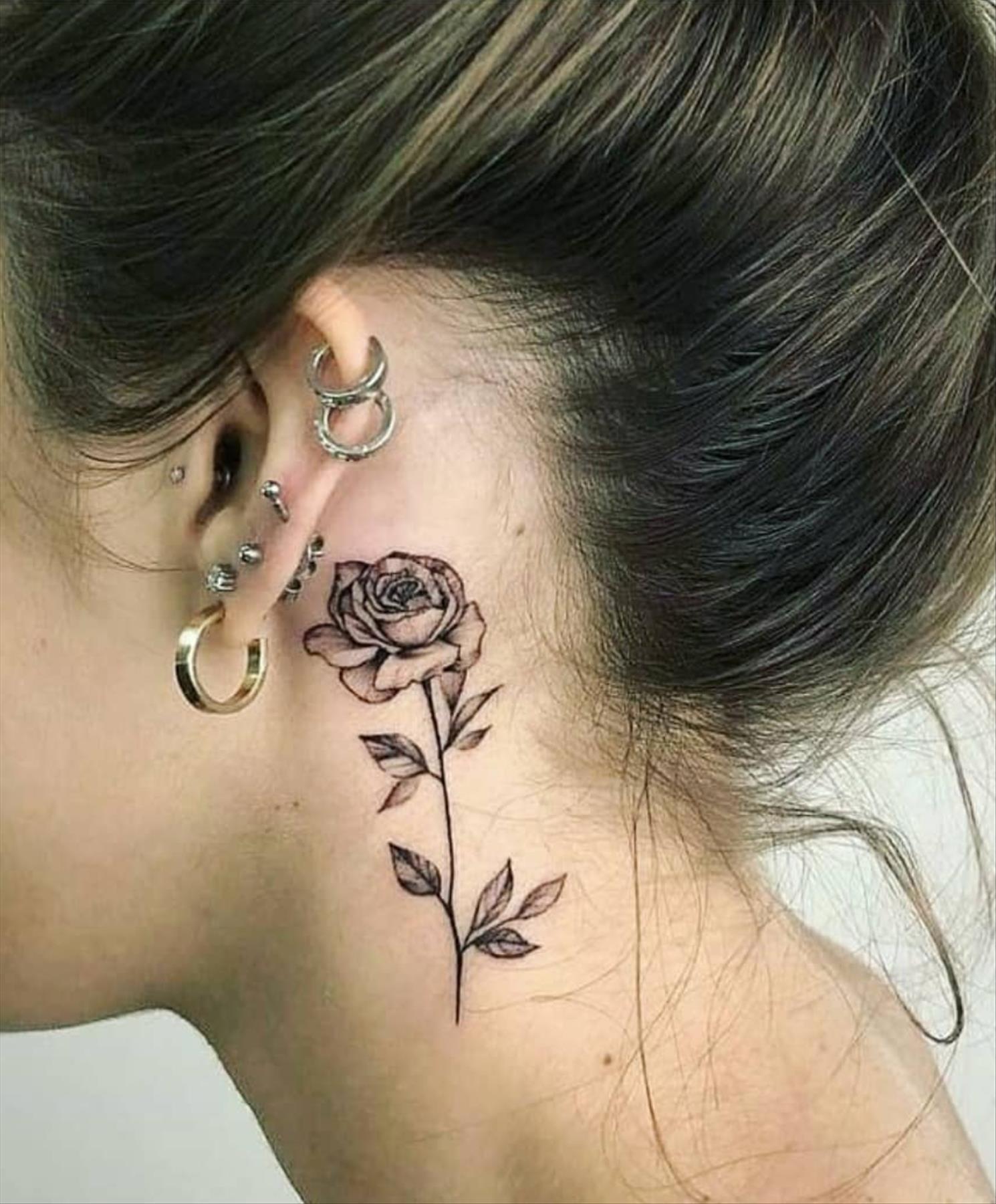 Cool behind the ear tattoos design for girls