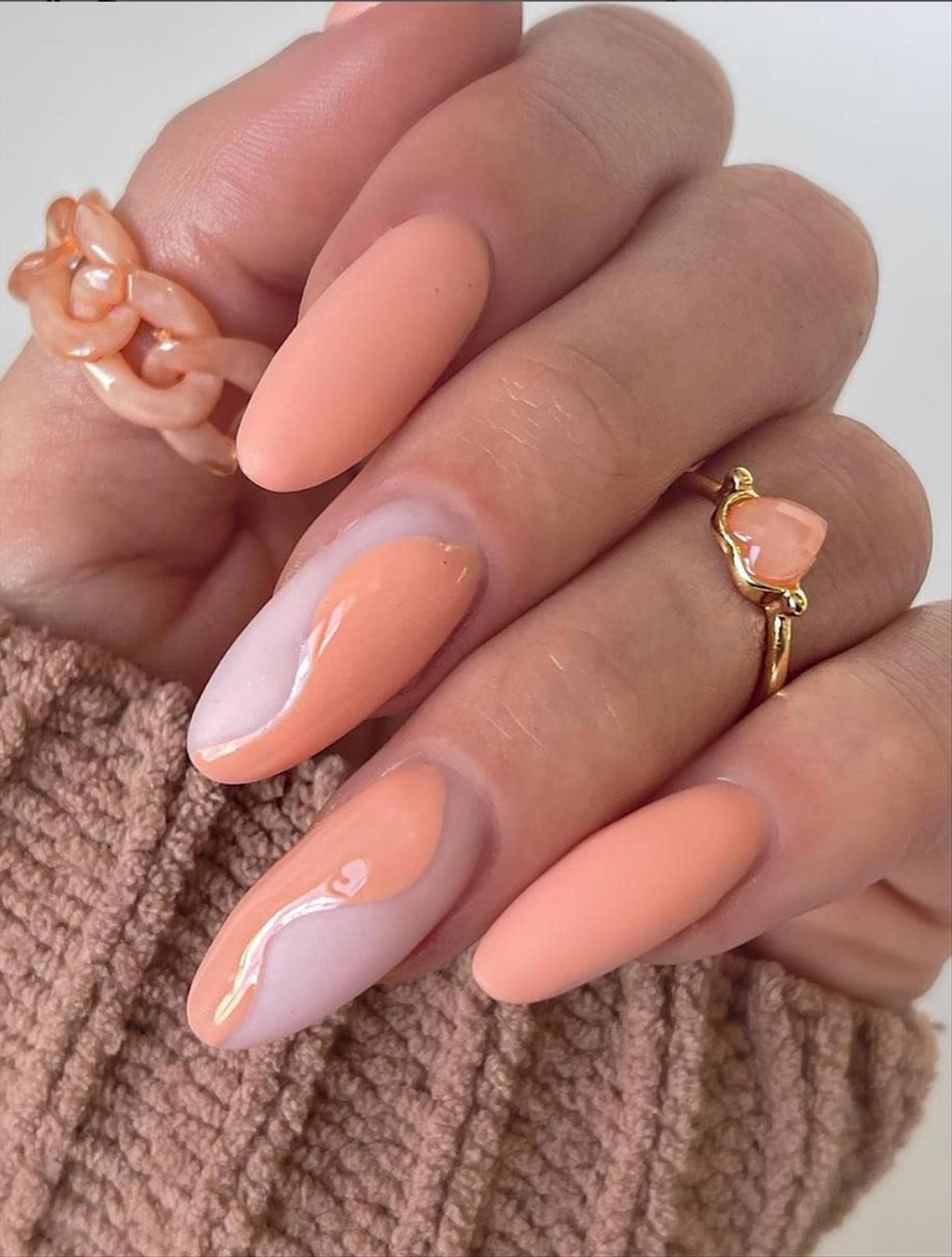 Trendy nail art with short almond shaped nails 2022