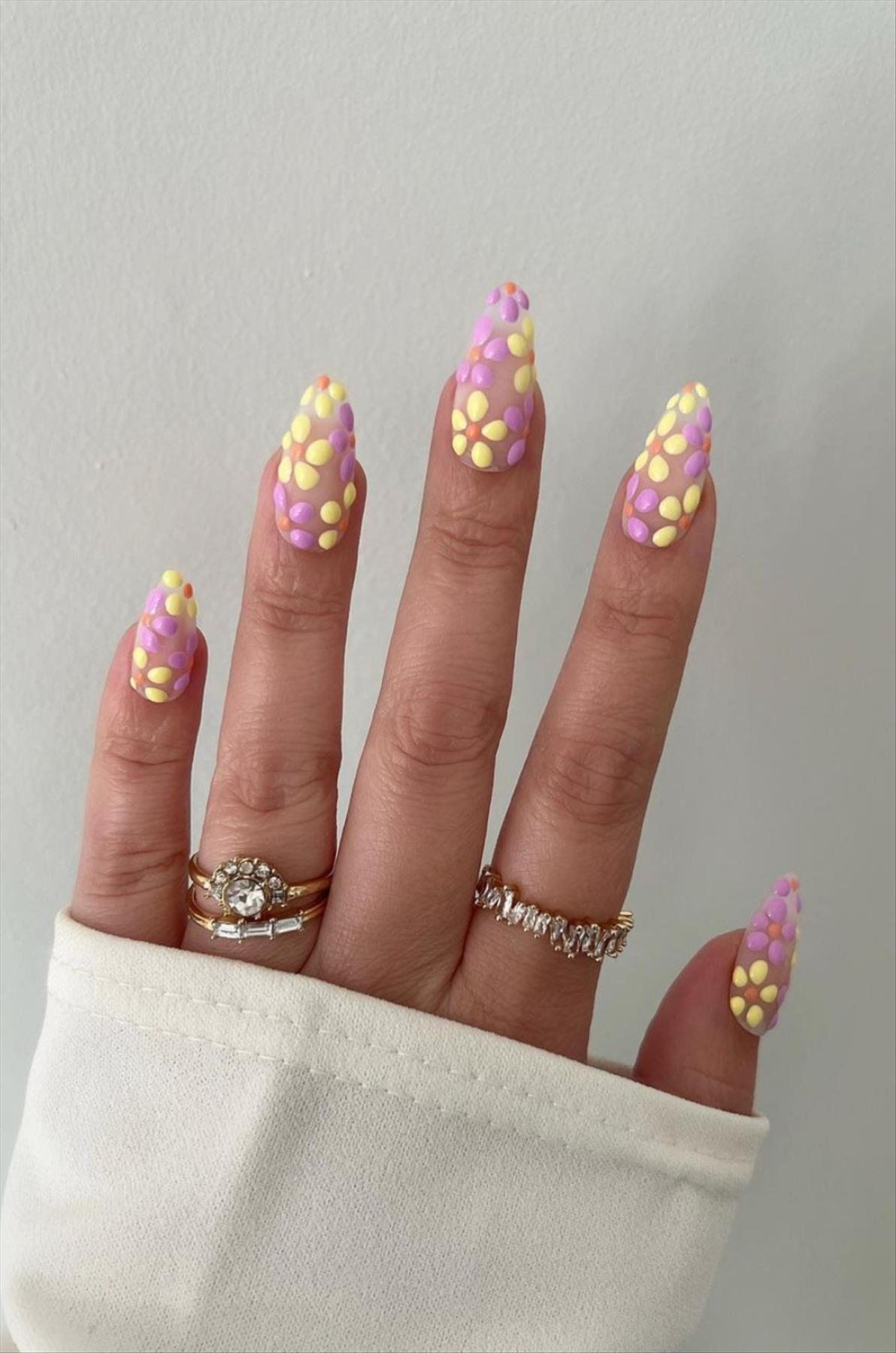 Trendy nail art with short almond shaped nails 2022