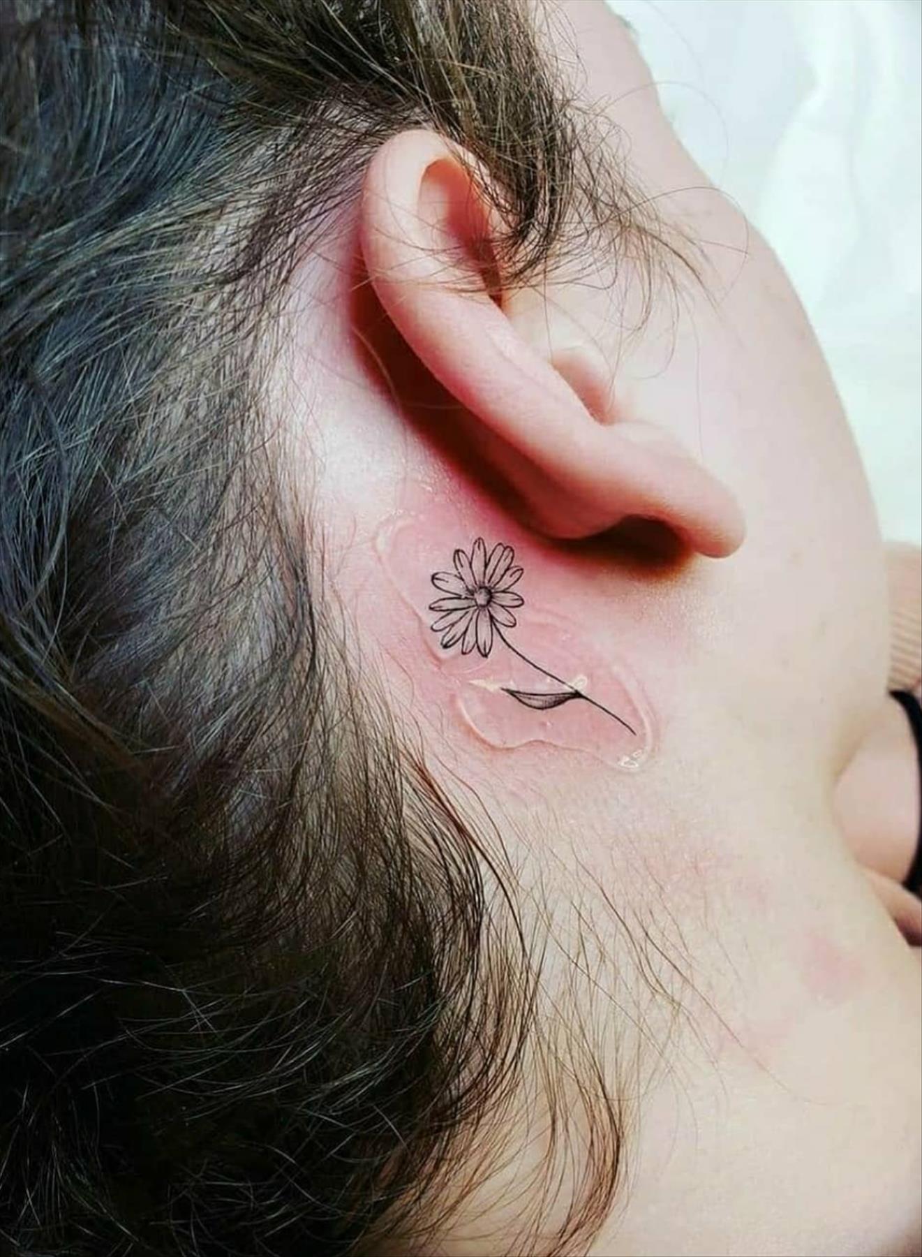 Cool behind the ear tattoos design for girls