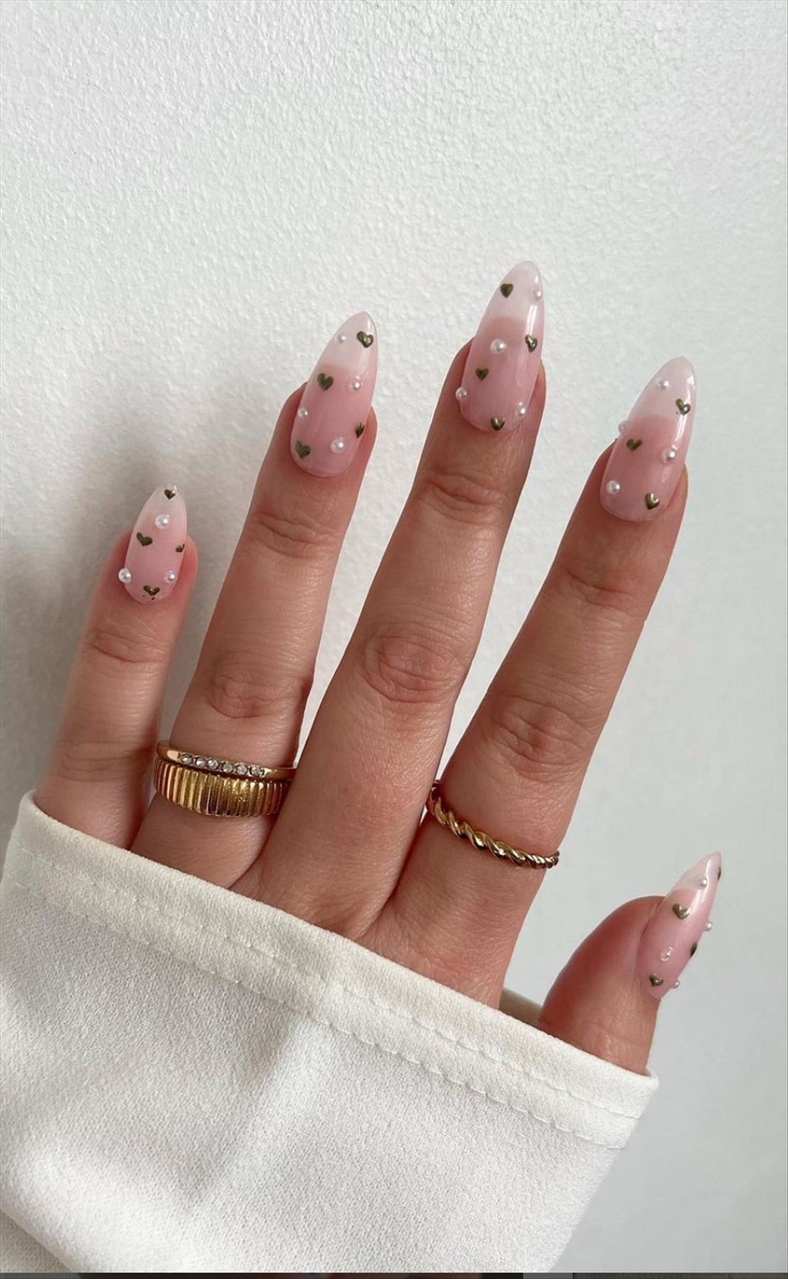 Trendy nail art with short almond shaped nails 2022