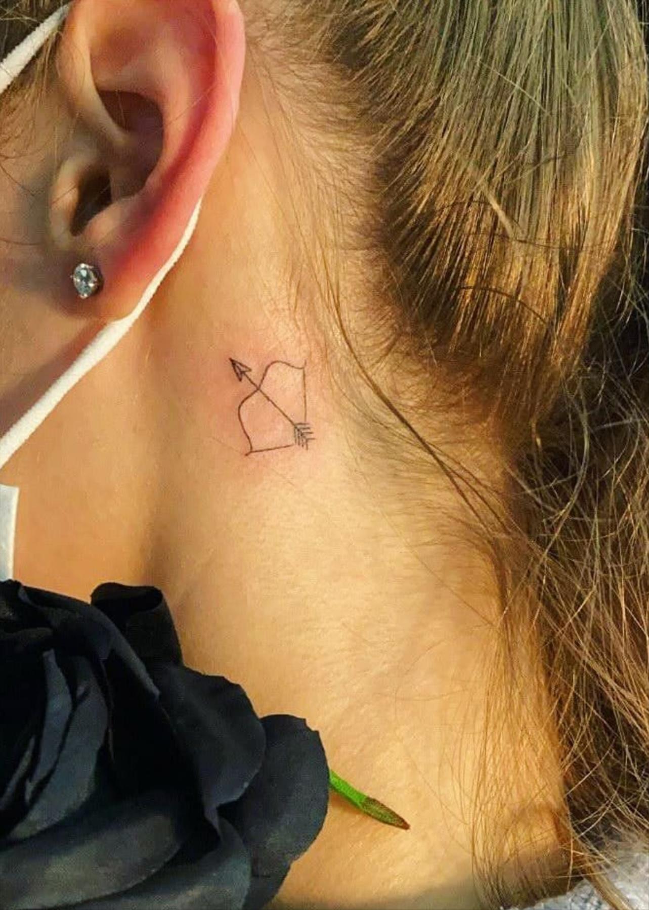 Cool behind the ear tattoos design for girls