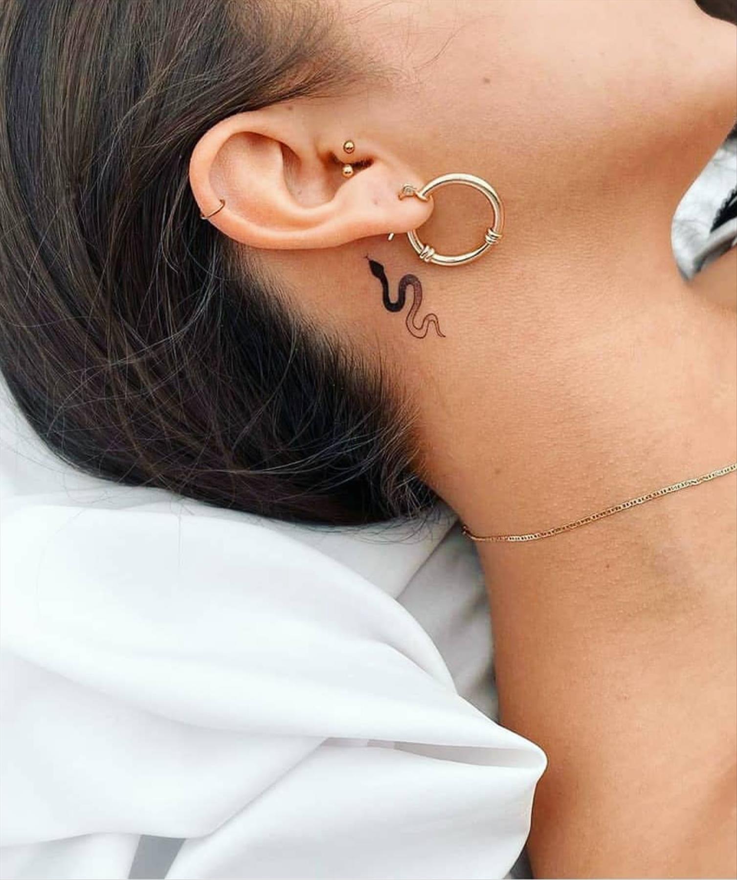 Cool behind the ear tattoos design for girls