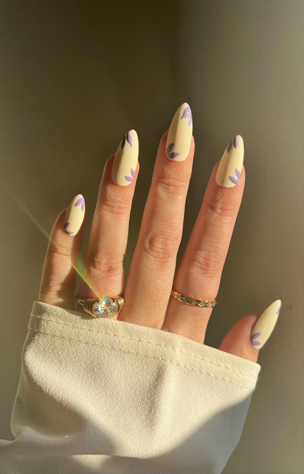 Trendy nail art with short almond shaped nails 2022