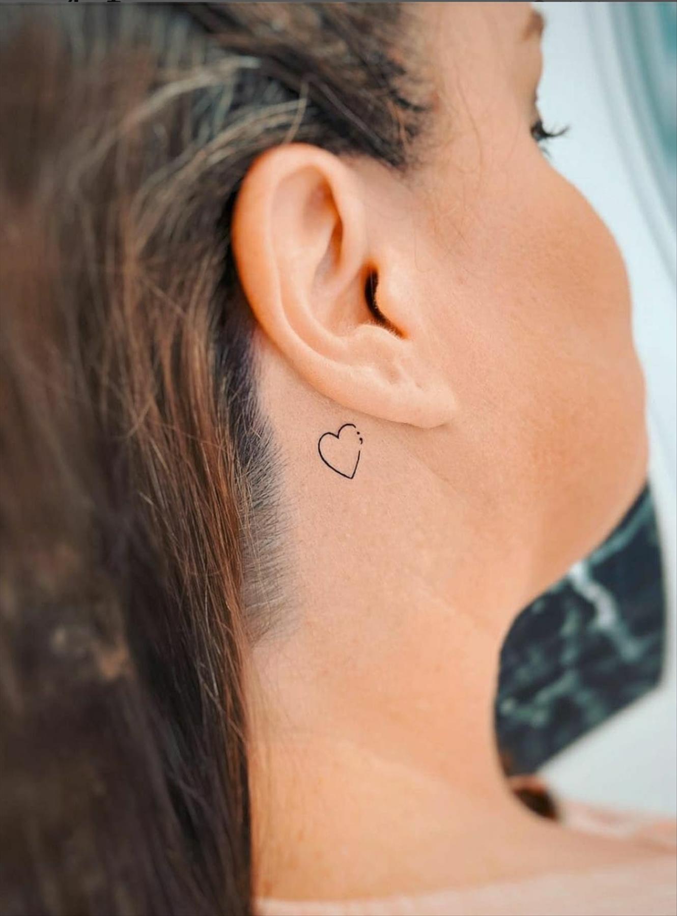 Cool behind the ear tattoos design for girls