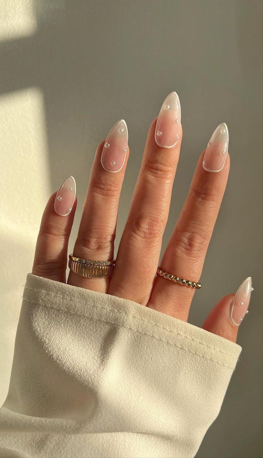 Trendy nail art with short almond shaped nails 2022