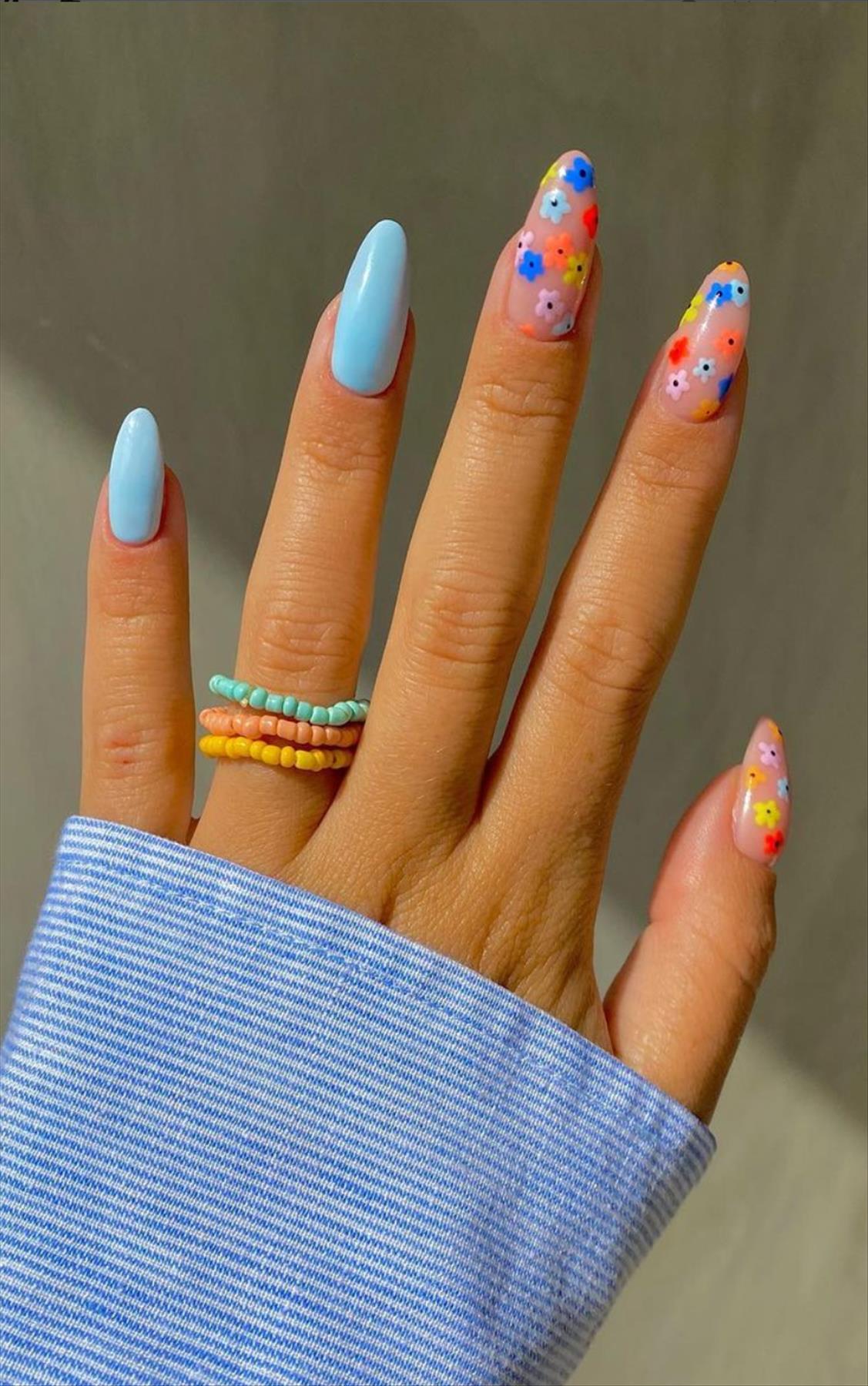 Trendy nail art with short almond shaped nails 2022