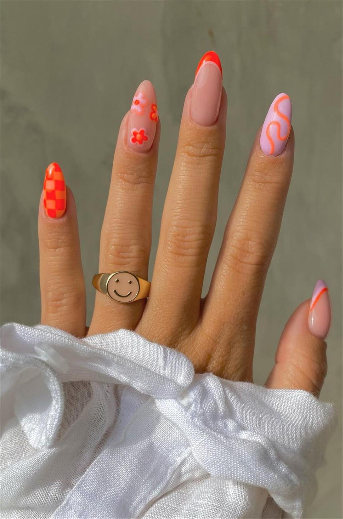 Trendy nail art with short almond shaped nails 2022