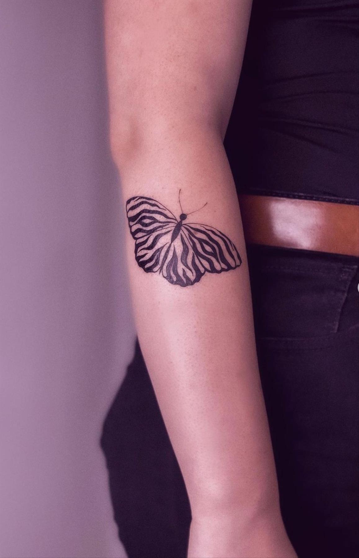 Bold butterfly tattoo ideas for women 2022