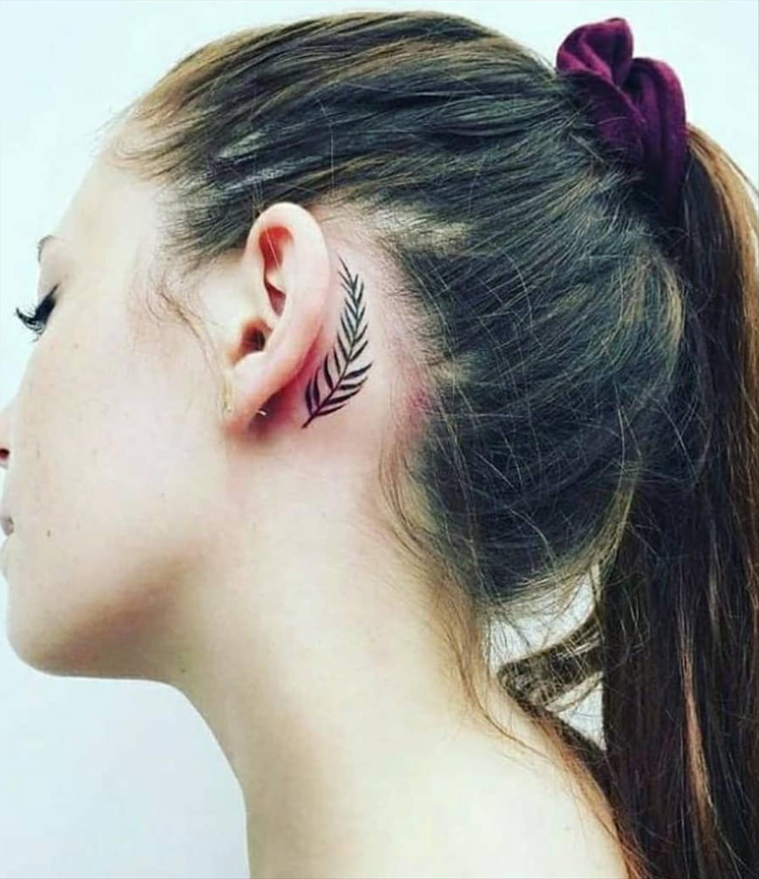 Cool behind the ear tattoos design for girls