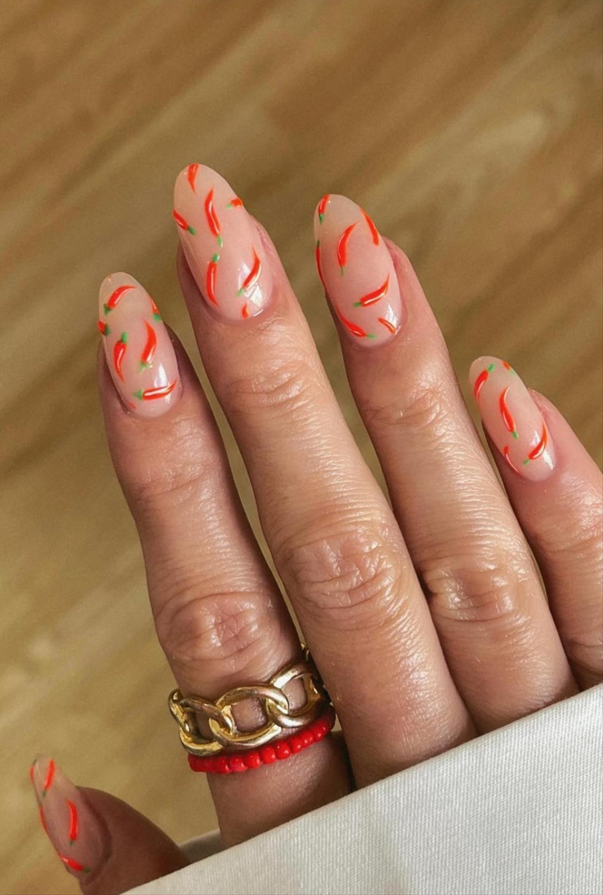 Trendy nail art with short almond shaped nails 2022