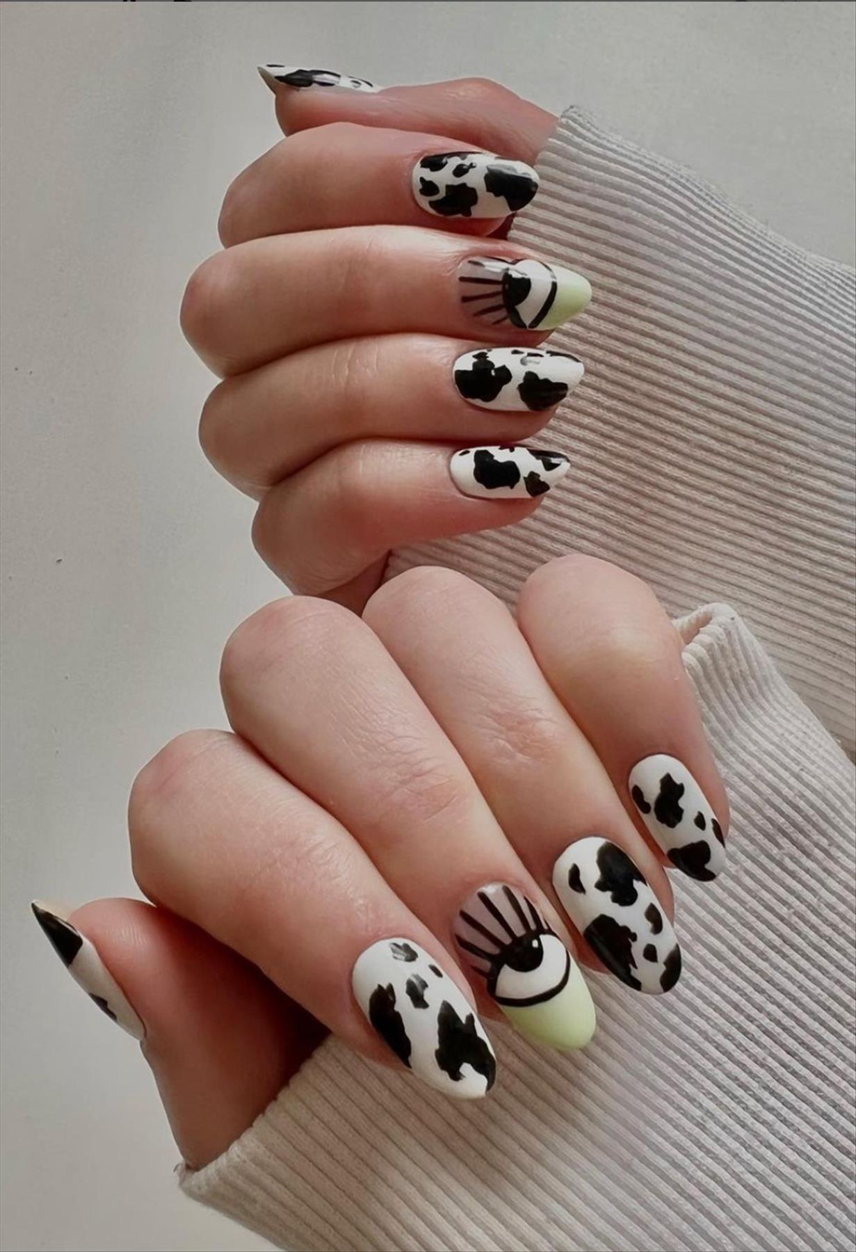 Trendy nail art with short almond shaped nails 2022