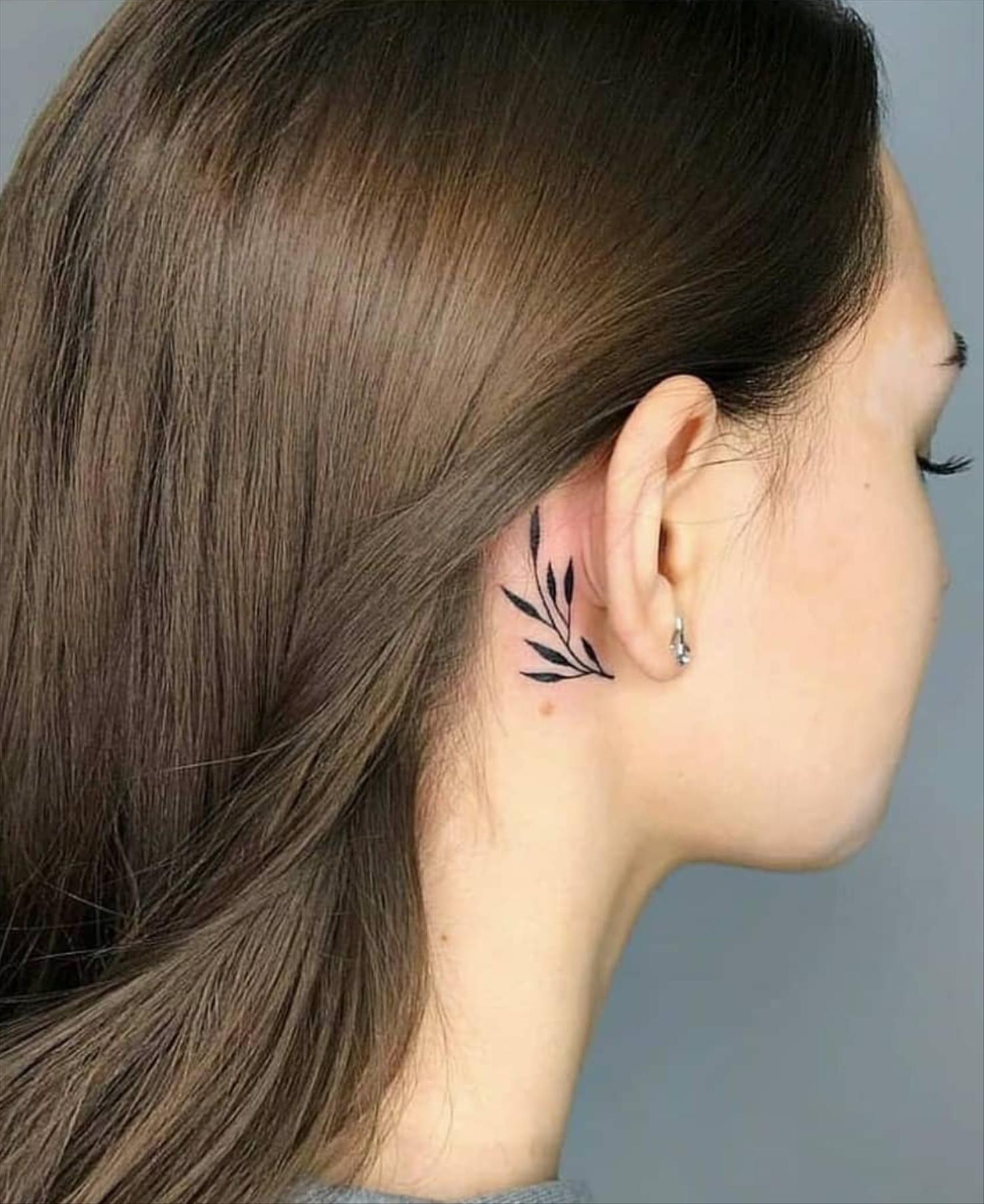 Cool behind the ear tattoos design for girls