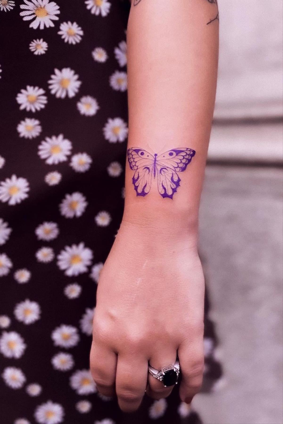 Bold butterfly tattoo ideas for women 2022