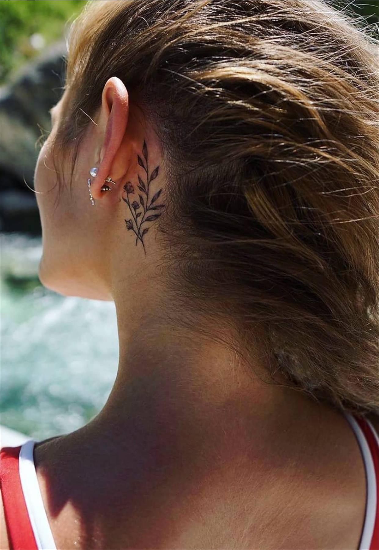 Cool behind the ear tattoos design for girls