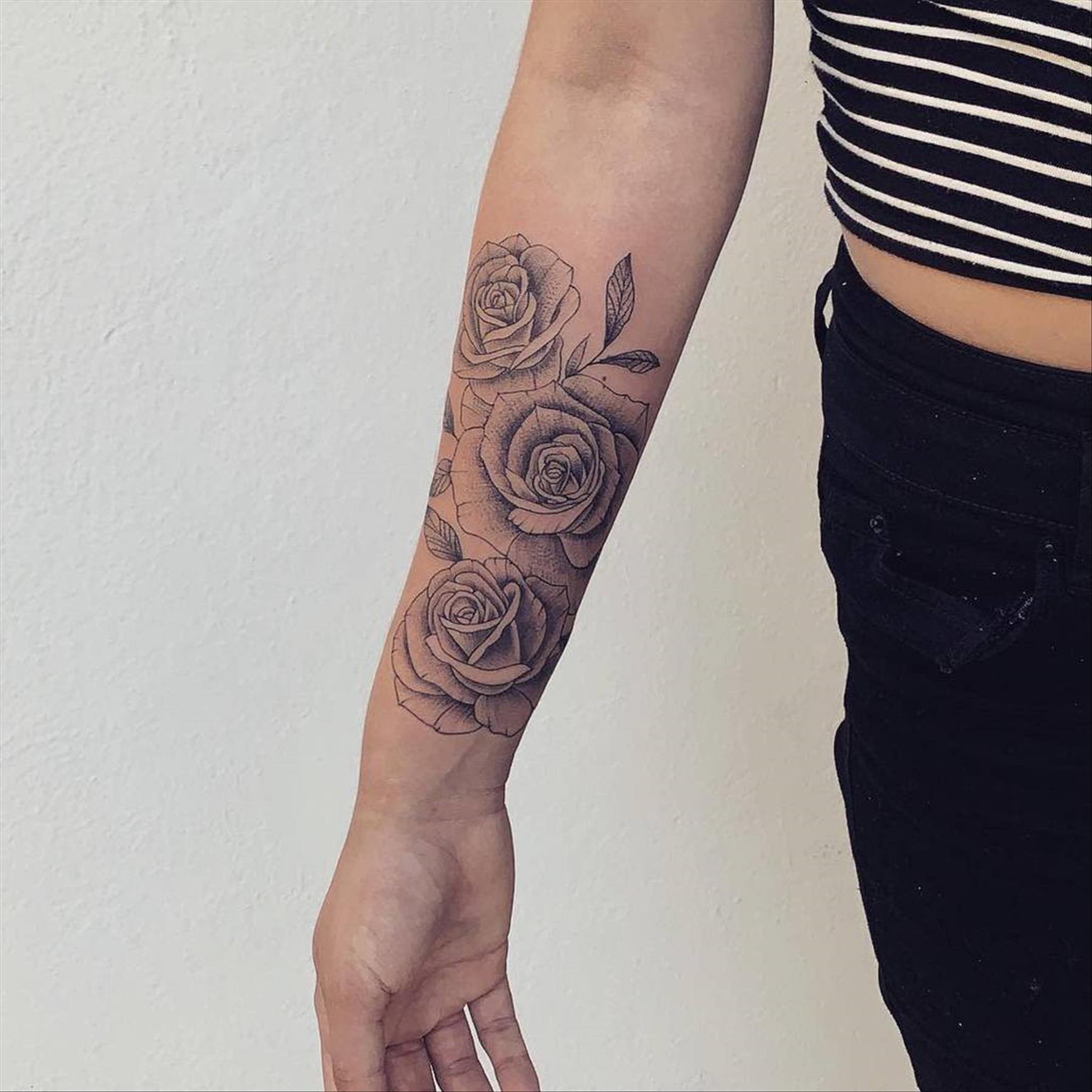 Elegant rose tattoo designs for women to ink now