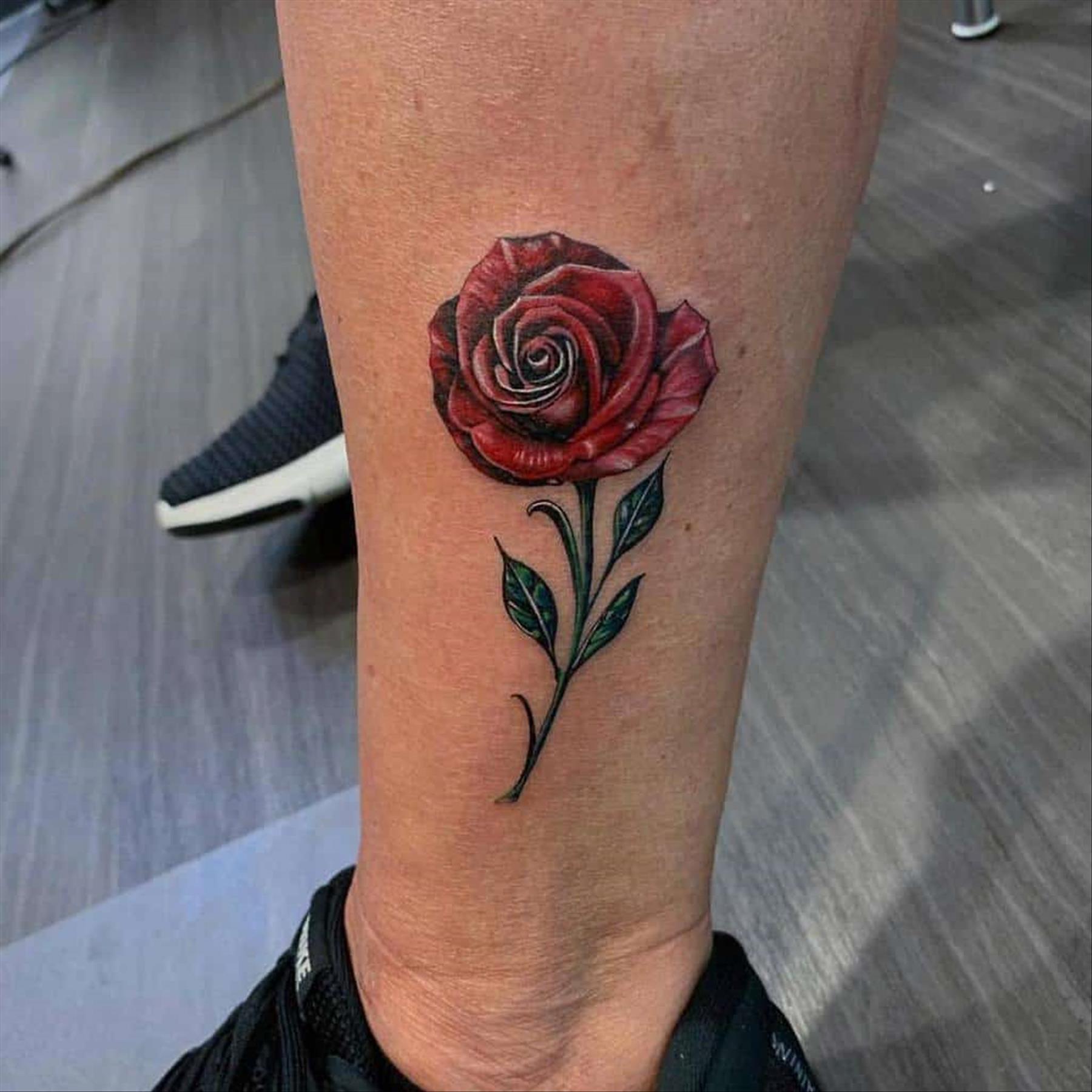 Elegant rose tattoo designs for women to ink now