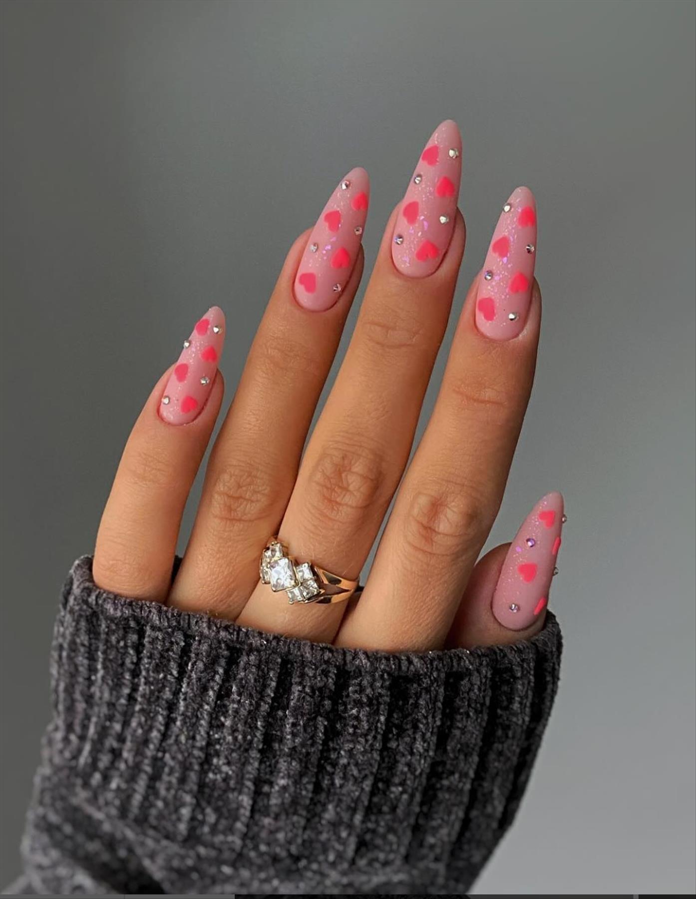 Sweet short Valentine's Day manicures with almond nail shapes