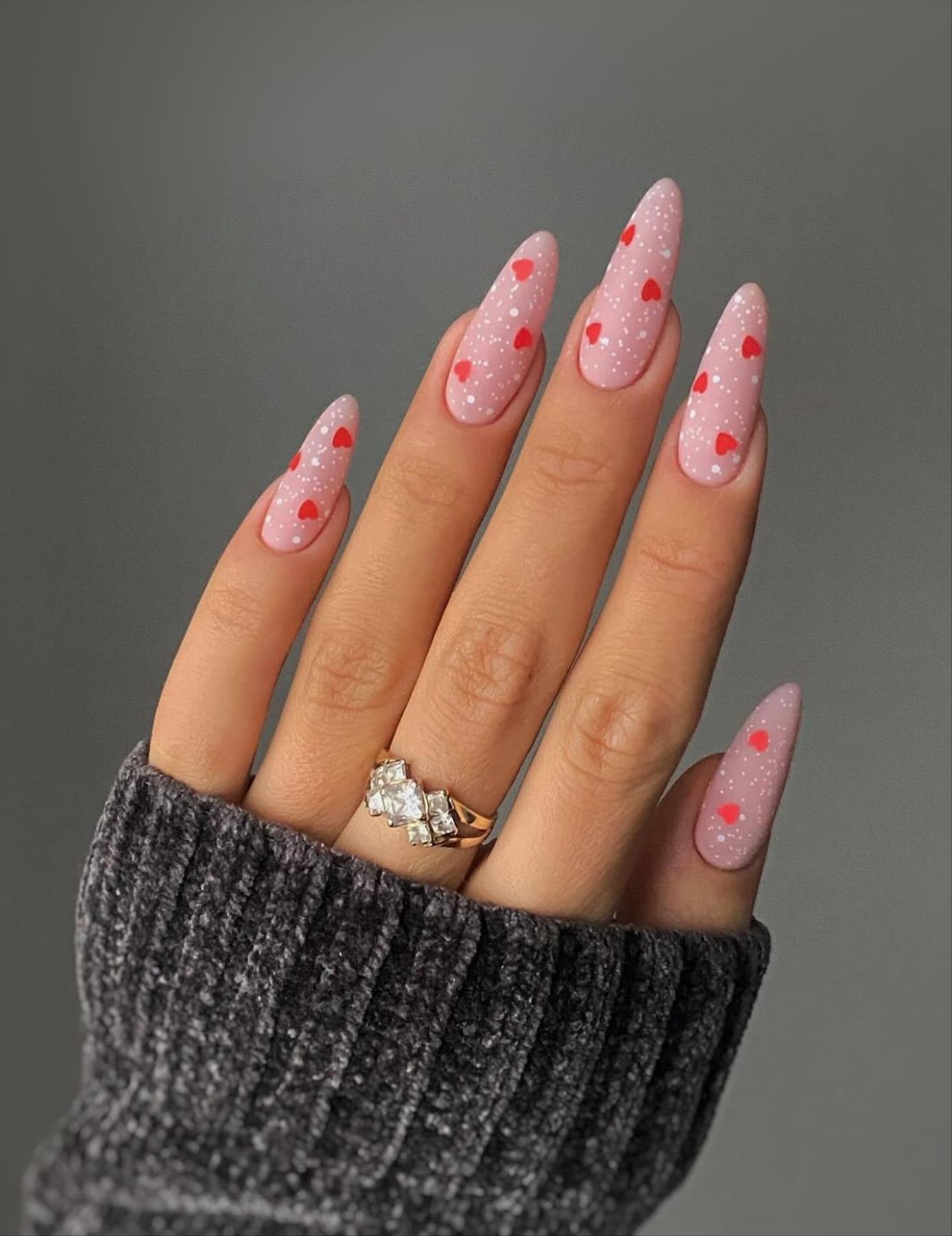 Sweet short Valentine's Day manicures with almond nail shapes