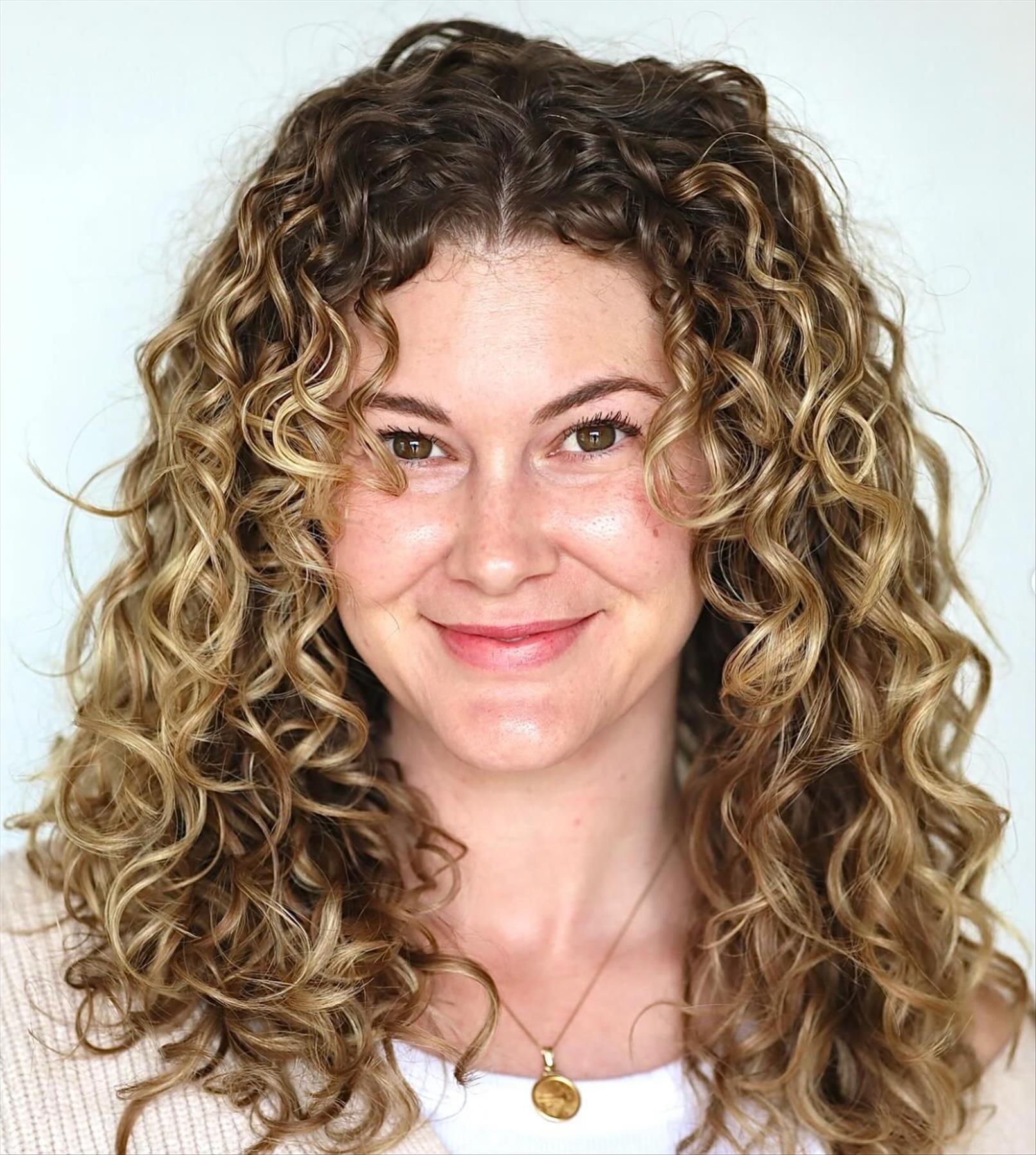 Best layered face-framing curly hairstyles Trending in 2024 