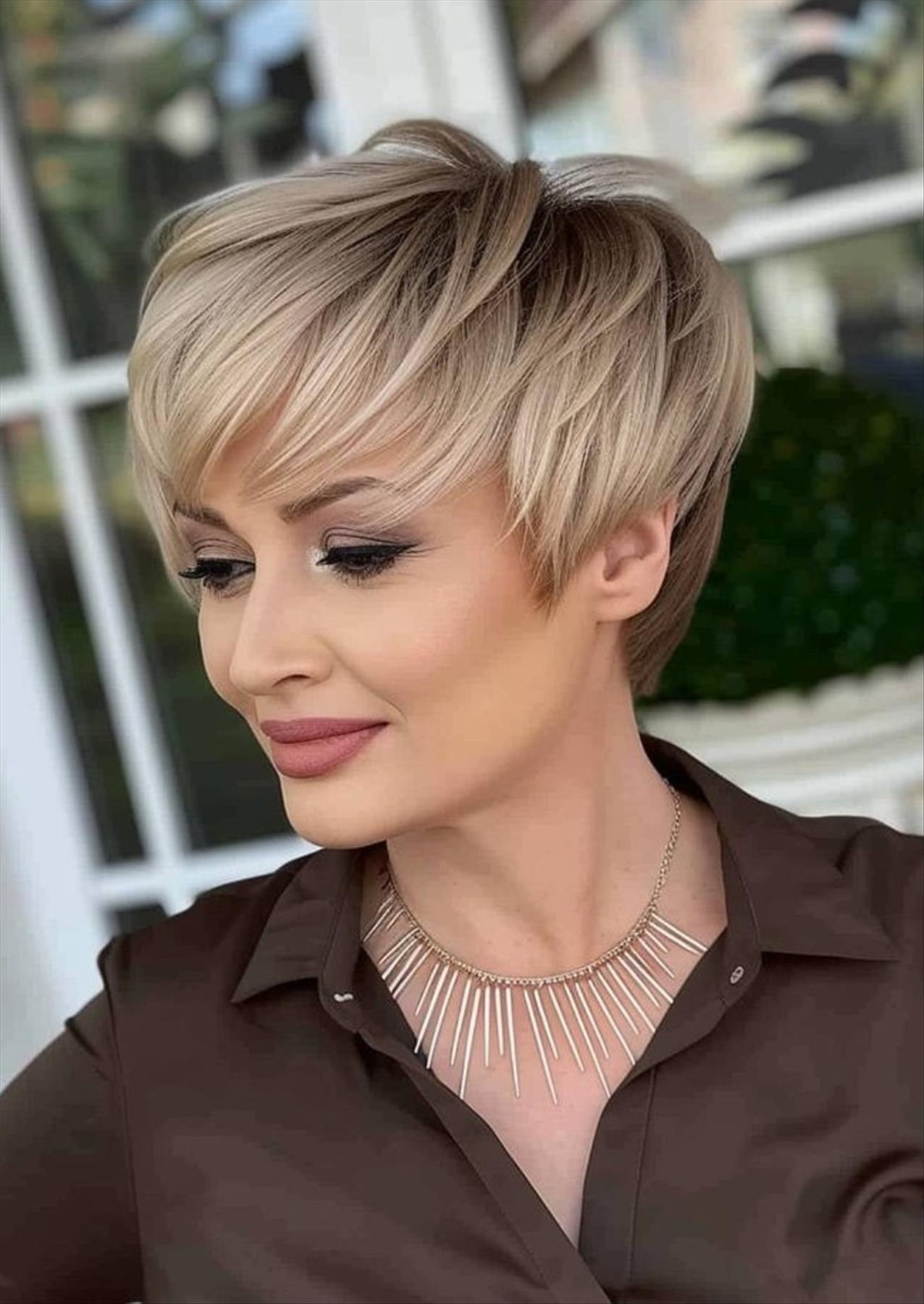 Elevate Your Style with an Ash Blonde Pixie Haircut